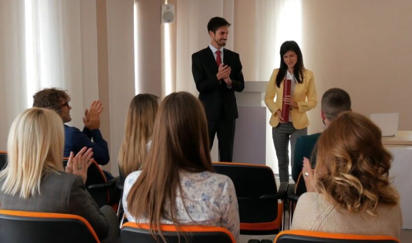 Students getting college diplomas